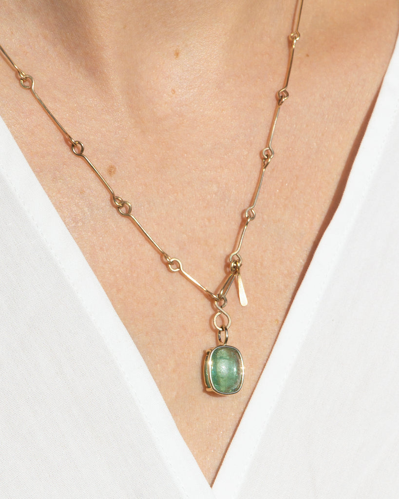 14K Floating Tourmaline Bone Chain Pendant